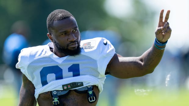 Indianapolis Colts defensive end Yannick Ngakoue (91) signals to fans during training camp Wednesday, Aug. 17, 2022, at Grand Park in Westfield, Ind.